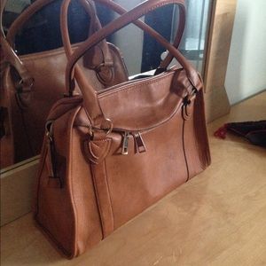 Never been used Street Level handbag.