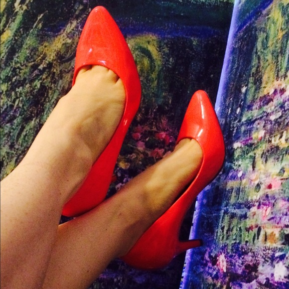 Neon pink pumps