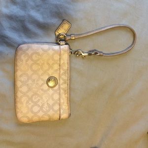 White and silver coach wristlet