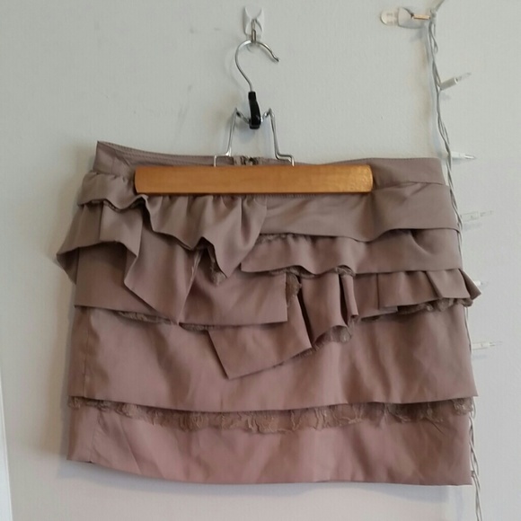 Light brown, ruffle and lace skirt.