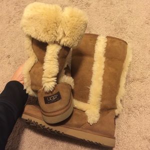 Tan and suede fur lined UGGS