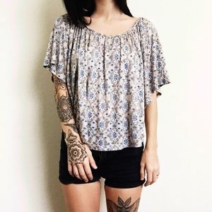 Super cute flowy top with low back