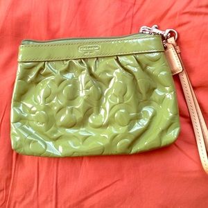 Shiny green leather Coach clutch wallet