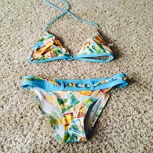 Bikini top large bottom medium small tear