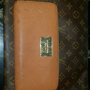 Brown Michael Kor's wallet