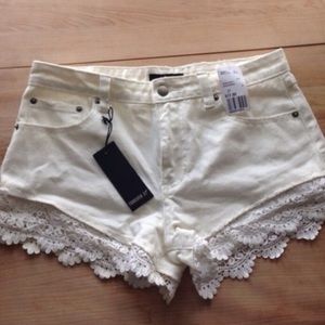 white crochet trim shorts