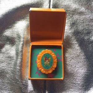 Tarina Tarantino electric butterfly cameo gloss