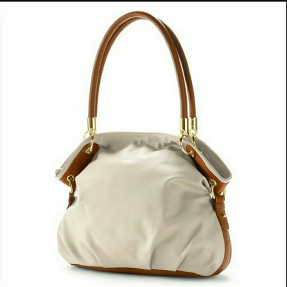 Beige purse. NEW WITH TAGS