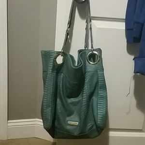 Turquoise steve madden pocket book