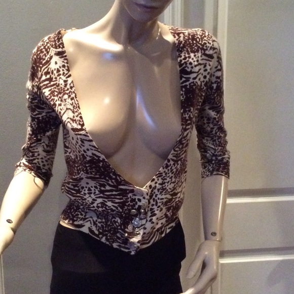 Brown and white sweater with designer buttons