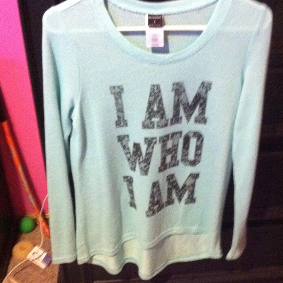I am who I am blue sweater.