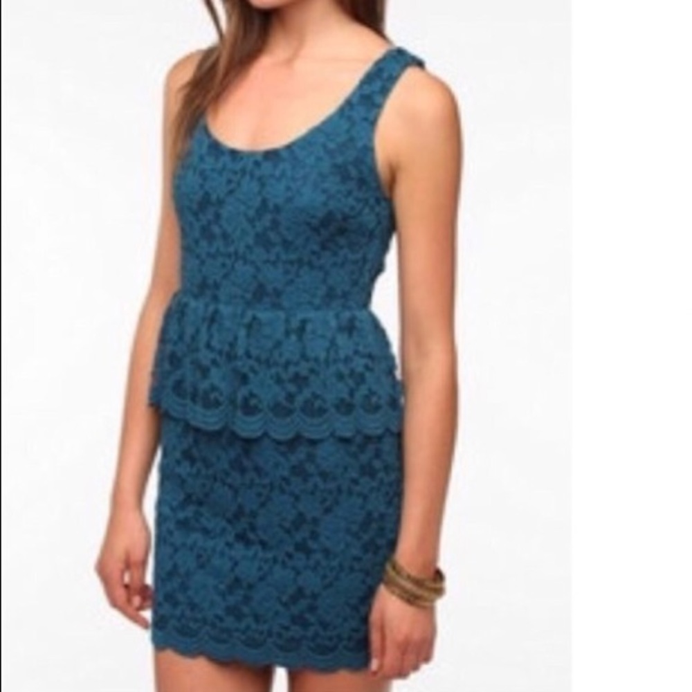 Peplum lace dress with cutout back