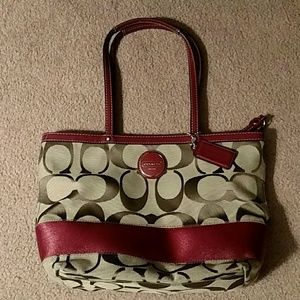 Red and brown Coach purse