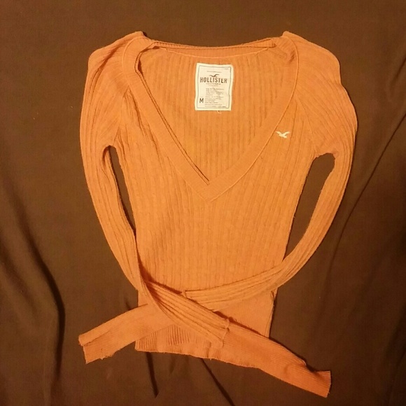 Burnt orange colored light sweater