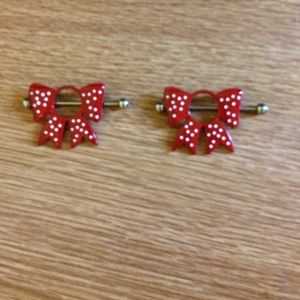 Bow nipple rings