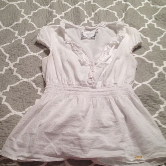 White guess shirt with pretty button details