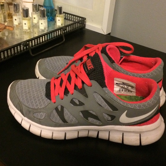 Gray and pink nike free run 2