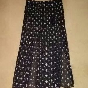 Sheer skirt with shorts underneath has 2 high spli