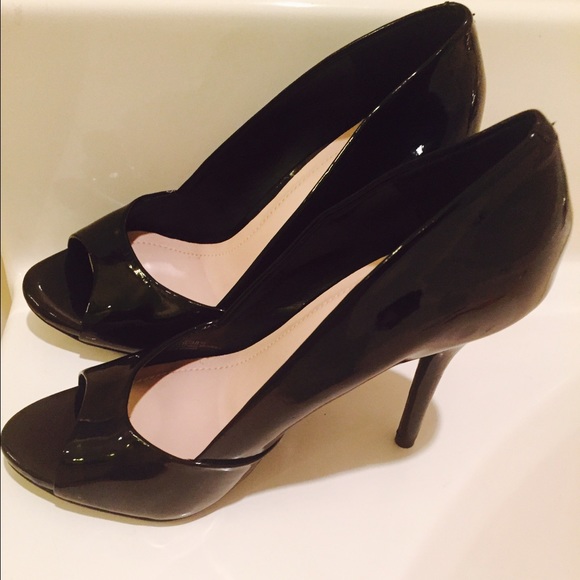 Open toe black patent leather 4 in heels.