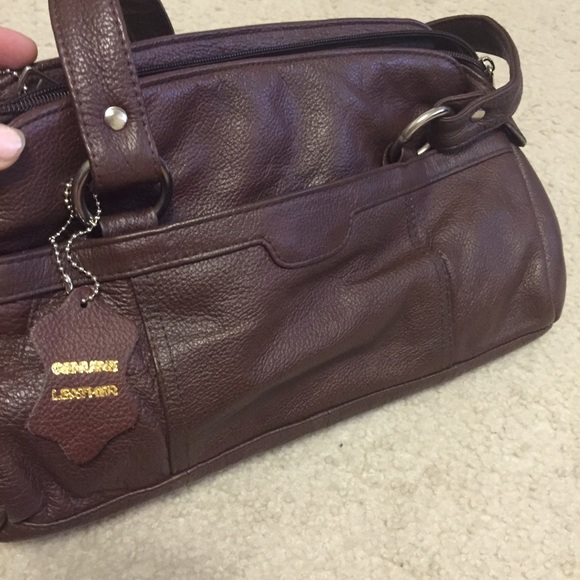 Purse with concealed weapon compartment