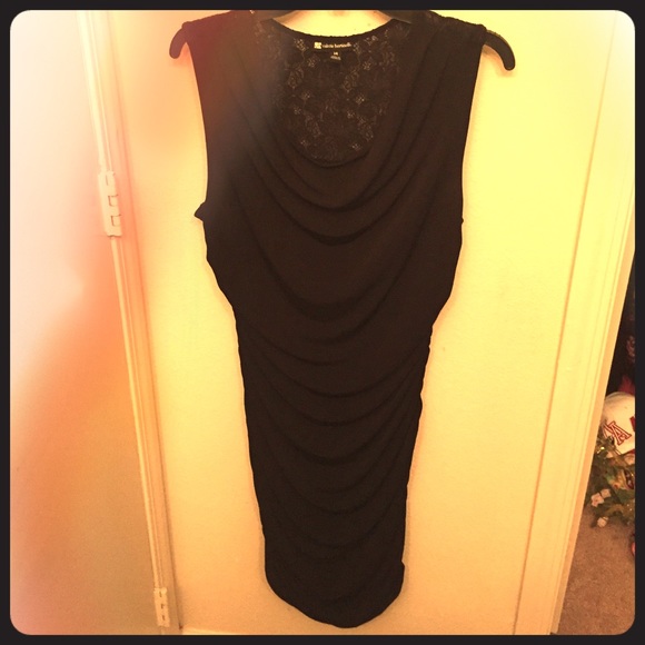 Body Conscious Black Dress with Lace Back