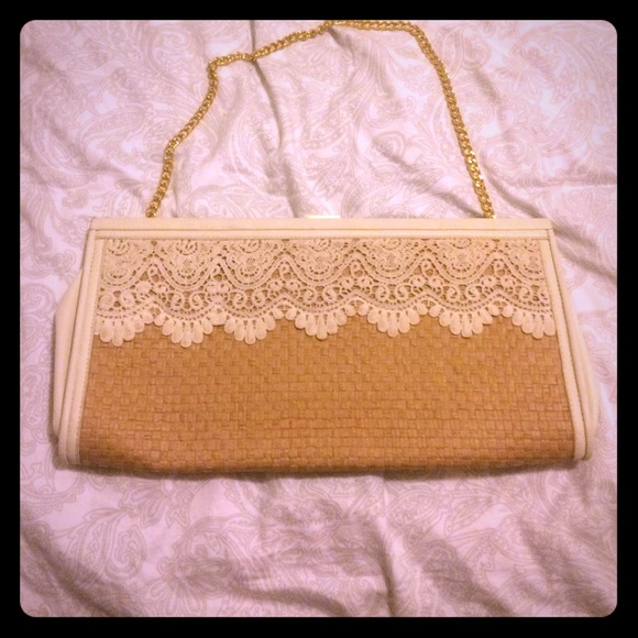 Lace clutch with removable gold chain strap