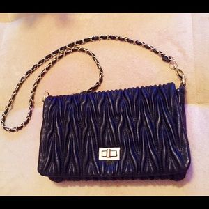Black leather clutch
