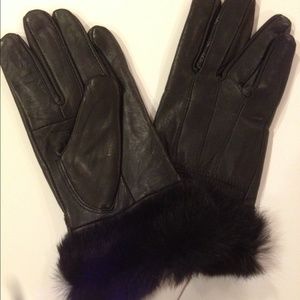 Black Leather gloves with faux fur trim.