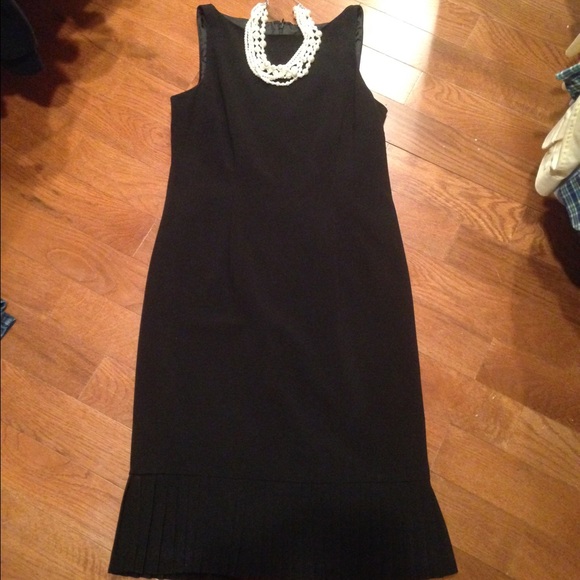 Black dress with pleated bottom
