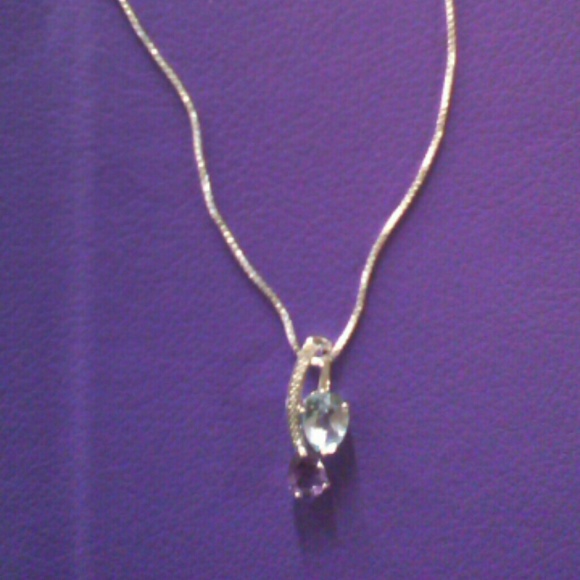 3.46 ct genuine blue topaz, amethyst and diamond