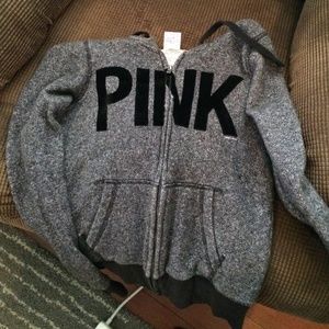 Grey and black vs zip up.