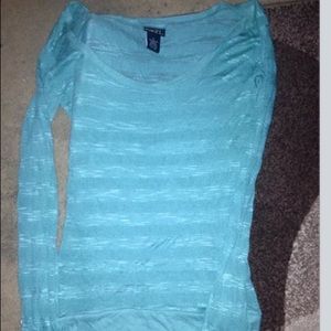 Sheer, long sleeved shirt