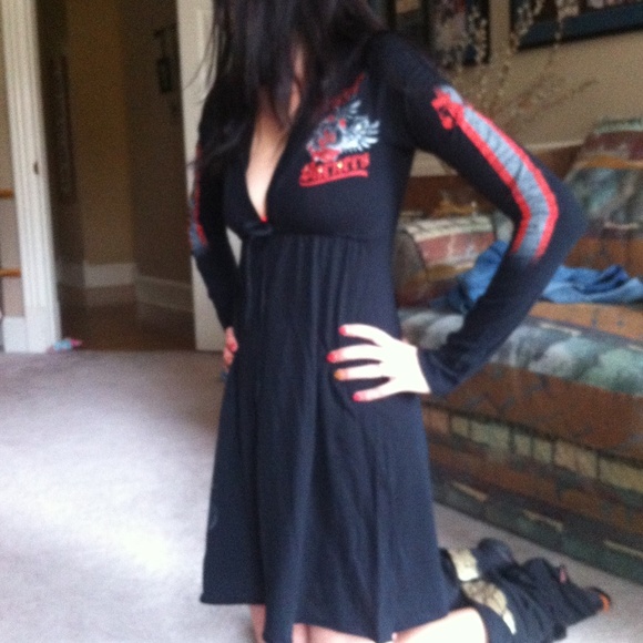 Bejeweled hooded dress. Available in M