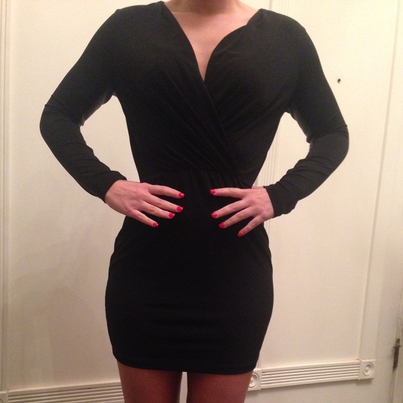 Black dress with leather accent on the sleeve