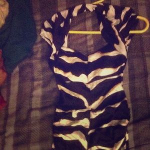 Dress . Gold white and black .