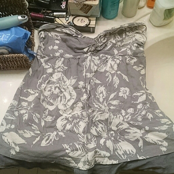 Strap less shirt with flowers on it