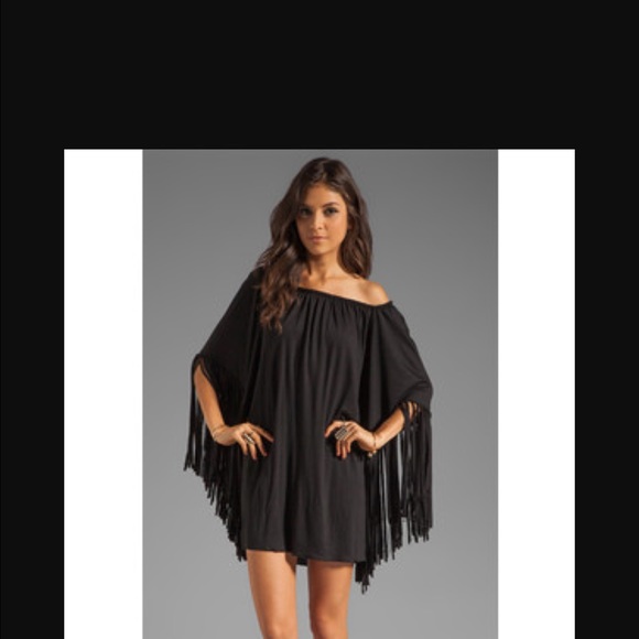Super cute black Mimi dress with fringe arms