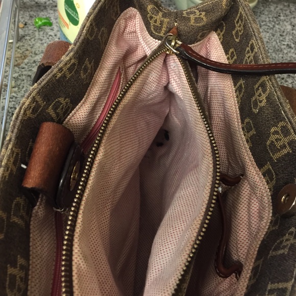 Ink stain hidden in bottom corner of middle zipper