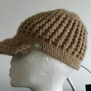 Tan in color hat