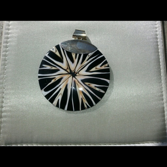 Sterling silver and shell pendant.