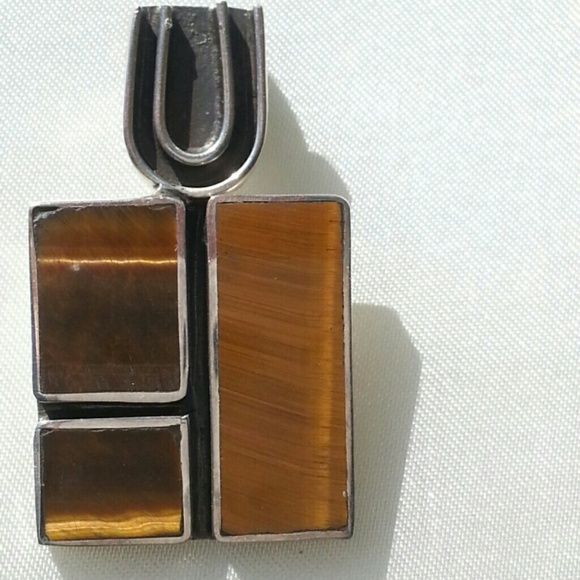 Silver and tigers eye slide.