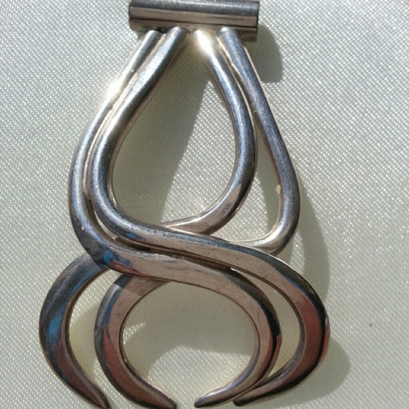 Sterling silver pendant.