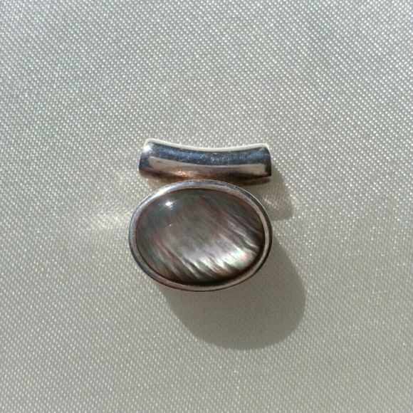 Abalone and silver pendant.