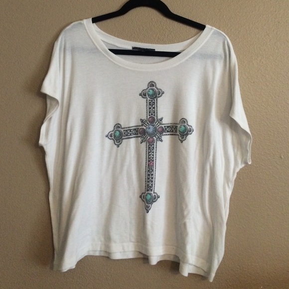 Truly Madly Deeply cross symbol top
