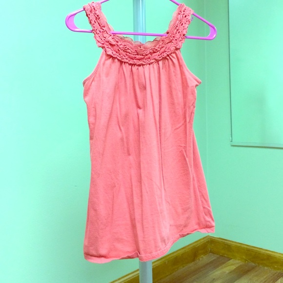 Orange tank with intricate collar