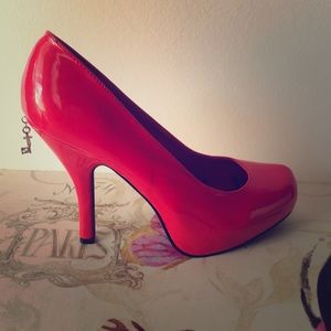 Red Penthouse Pumps