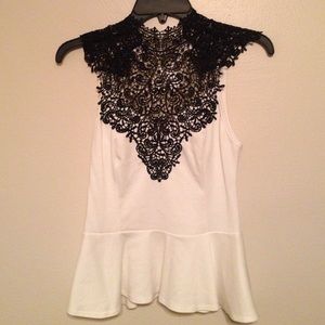 White peplum with black lace chest