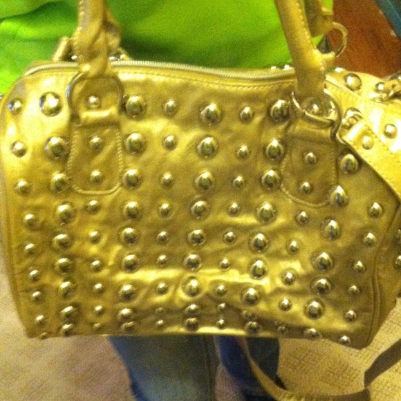 Gold studded handbag