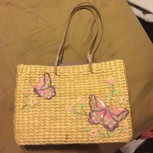 Straw handbag with butterflies