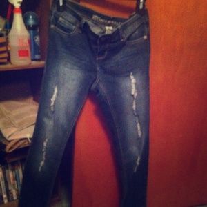 Ripped, dark wash skinny jeans